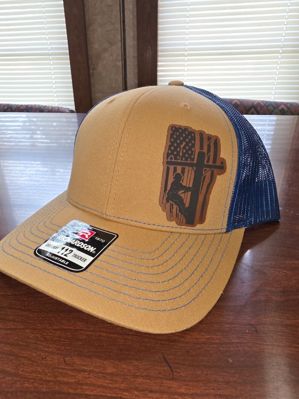 Richardson Tan/Blue Adjustable Mesh Back Trucker Hat USA Flag Lineman Graphic
